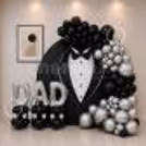 Decorating a Father's Day ring with a circular backdrop and letter balloons in the DAD foil.