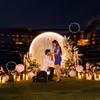 The background of flowers and a moon sets the scene of a romantic proposal dream.