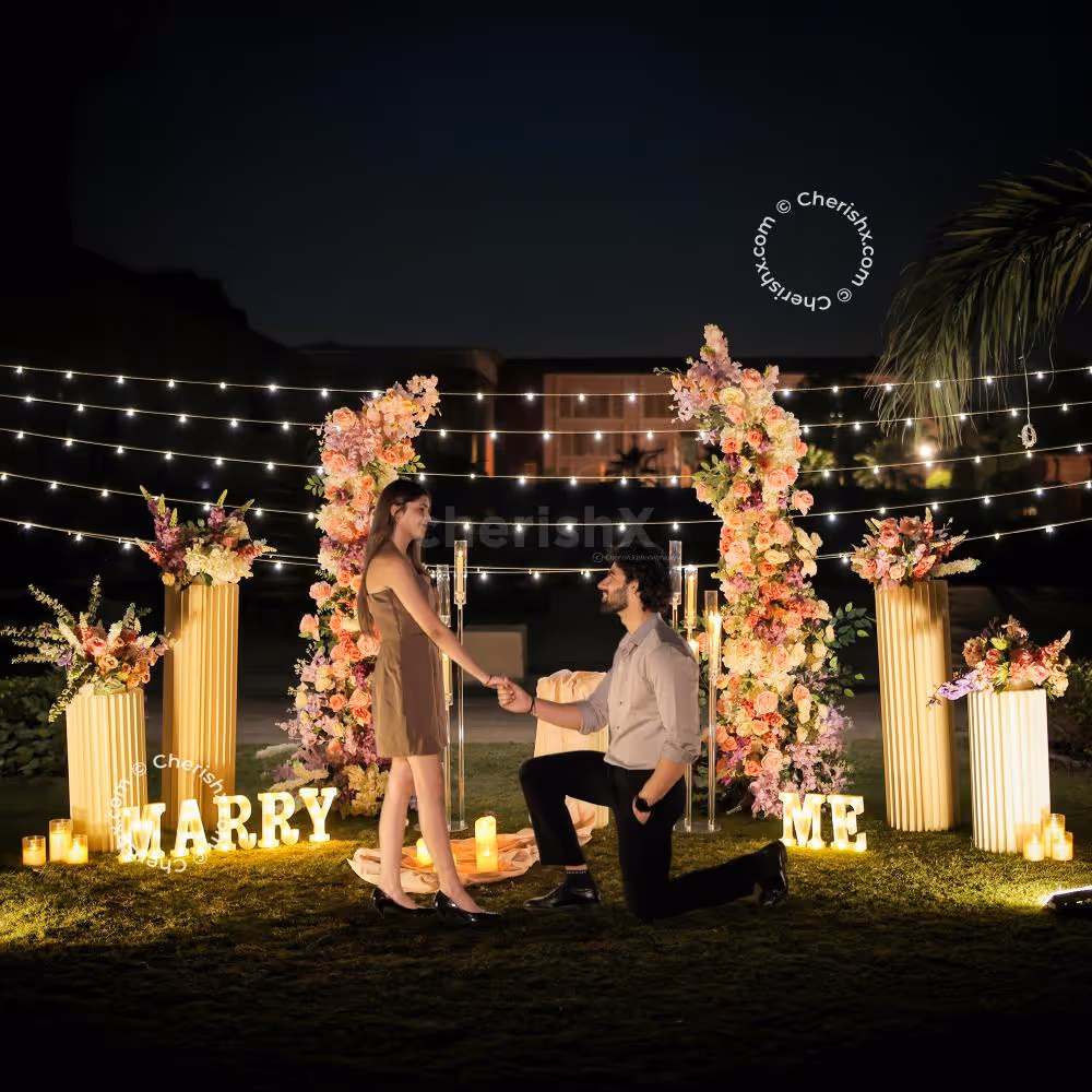 Elegant floral channels create a dreamy and romantic proposal backdrop.