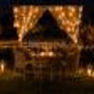Enjoy a romantic candlelight dinner by CherishX, set in a dreamy open-air horse stable with fairy lights, flowers, and a luxury private dining setup