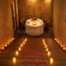 CherishX brings you a dreamy candlelight dinner setup with rose petals, glowing candles, and an intimate LOVE-themed table for couples.