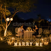 intimate farm proposal setup designed with elegant white flowers and a warm, enchanting atmosphere.