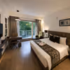 Contemporary premium room with balcony views and elegant modern interiors.