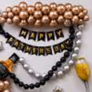 Decorate For Happy Father’s Day With Chrome Champagne Balloons And A Classy Party Background Setup.