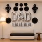 Few Dad's Day Decor Ideas with Black balloons clusters, paper fans and DAD letter balloons.