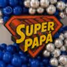 Indoor Father’s Day Decor With A Superhero-Style Super Papa Sign And Premium Balloon Backdrop.