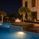 Private Candlelight Date Setup by the Pool Perfect for Anniversaries and Special Occasions