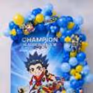 Custom Backdrop With Beyblade Artwork And Balloon Clusters On Both Sides, To Match The Theme Of The Champion.