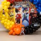 Birthday Decoration For Beyblade With Red, Blue, Yellow, Orange And Black Balloons.