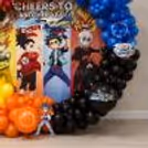 Round Balloon Decoration In Bright Party Colours With Beyblade Characters.