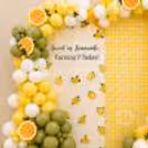 Fresh Citrus Decoration With Orange Accents In Slices, Green Leaves And Curved Design Of Yellow And White Balloons.