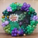 Green, Purple, Black and Golden Balloon Arch Backdrop for Hulk Theme Birthday Party.
