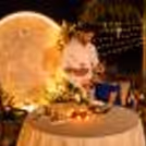 Moon Themed Proposal Dinner Decoration with elegant Candlelight dinner and floral decor.