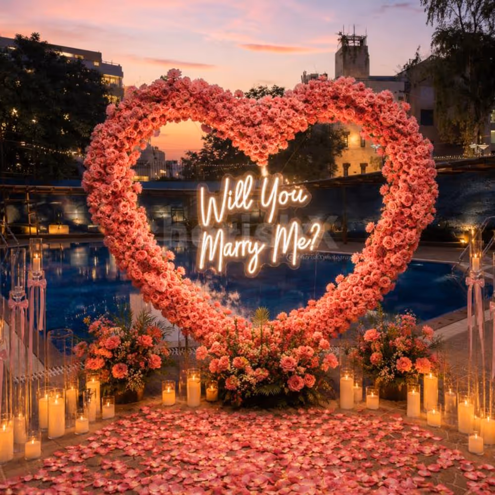 dreamy proposal setup full of pink roses by the pool