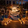 Dreamy poolside proposal venue with beautiful décor, glowing candles, and a private dining setup for couples.