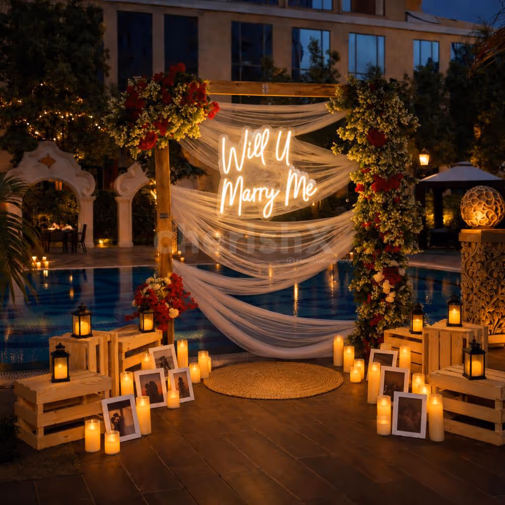 Dreamy poolside proposal venue with beautiful décor, glowing candles, and a private dining setup for couples.