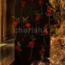 Black Floral Sunboard Covered With Elegant Red Roses.