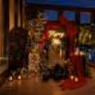 Grand Red Bow Proposal Dinner at Radisson. Marry Me neon sign, proposal decor, red bow entrance.