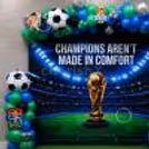 Celebrate Sports With A Paper Cut-Out Sports Theme, Football Balloons And A Sports Balloon Arch.