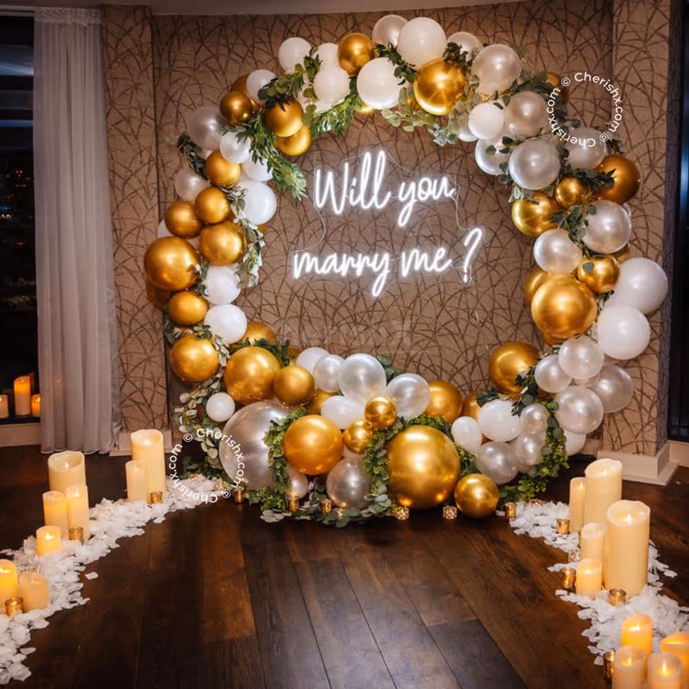 Golden And White Wall With Sparkling Text "Will You Marry Me?". A Decorative Candle On The Ground.