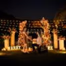Organise a surprise dinner outdoors, complete with a candle-lit path, floral décor and a stunningly decorated lawn.