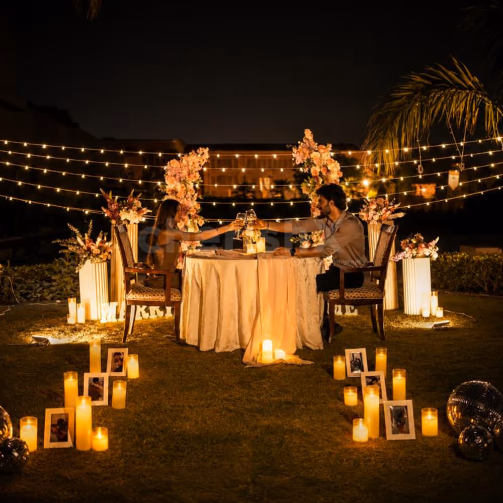 Private romantic dinner experience with glowing candles and dreamy décor.