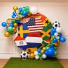 Football Theme Decoration Party For Kids Birthday With Country Flag Background And Balloon Garland.