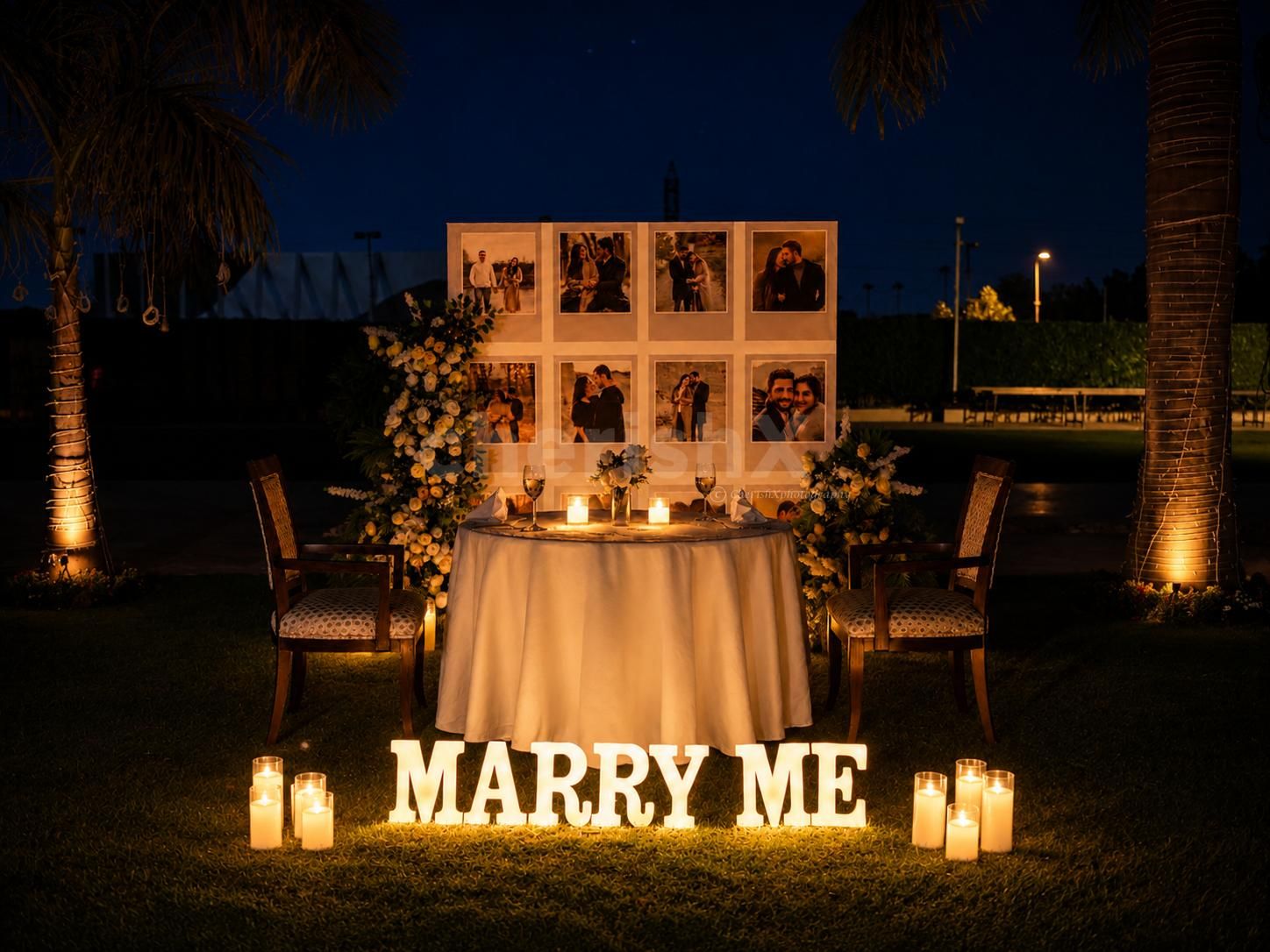 Personalized romantic dinner setup with framed memories, intimate décor, and a candlelit ambiance.