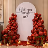 The balloon arch formed with red, stuffed with black balloons, looks like blood in veins.