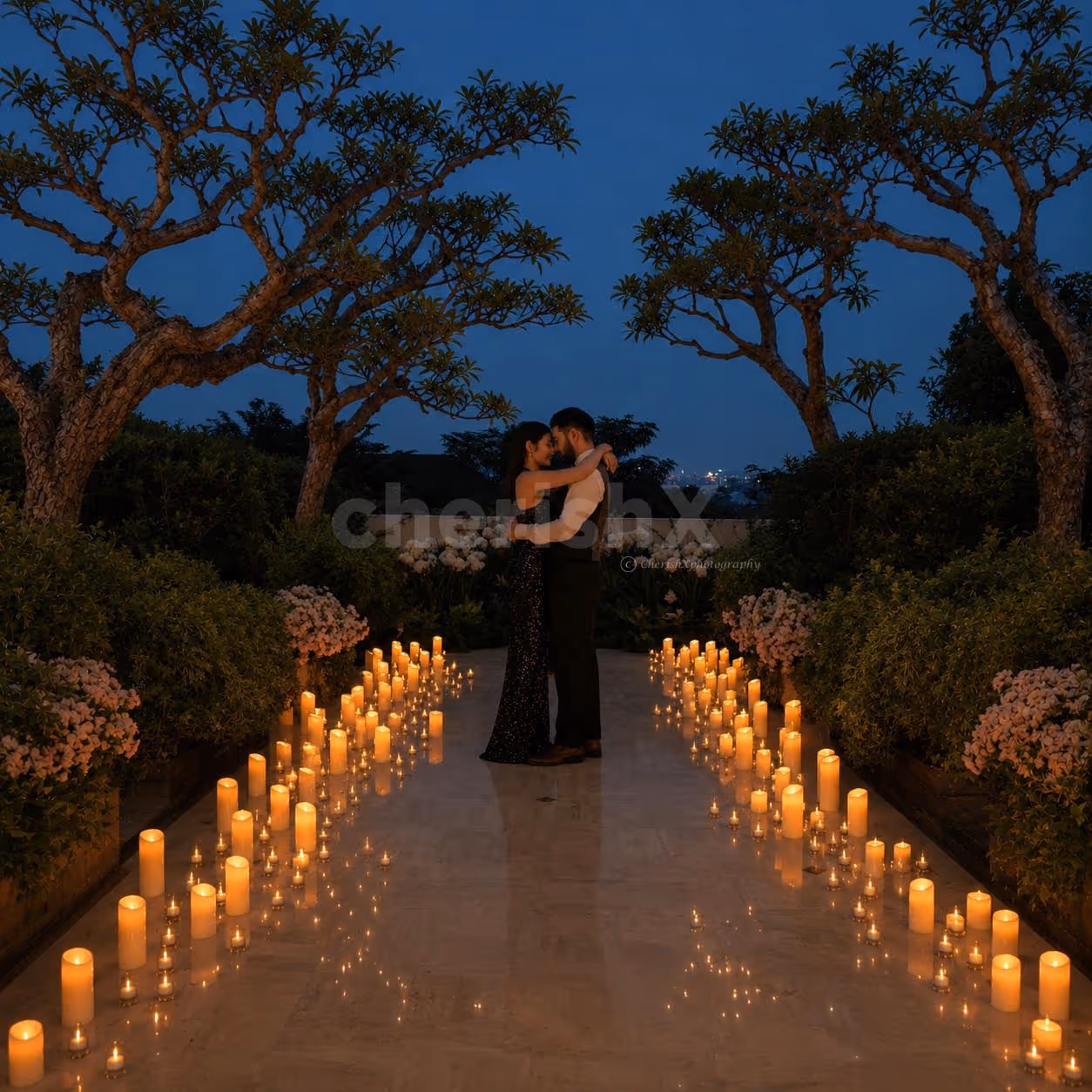 CherishX candlelight proposal decor with a romantic garden walkway, warm candles, flowers, and luxury evening ambience.