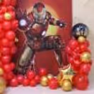 Iron Man Themed Birthday Party Decorations with Red balloons and gold balloons