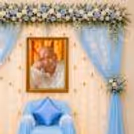 Gentle White And Blue Artificial Flower Bouquet Tied With Flowing Side Drapes, A Graceful Finishing Touch.