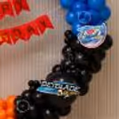 Black And Blue Balloon Cluster With Beyblade Burst Logo For A Kid's Birthday Party Theme.