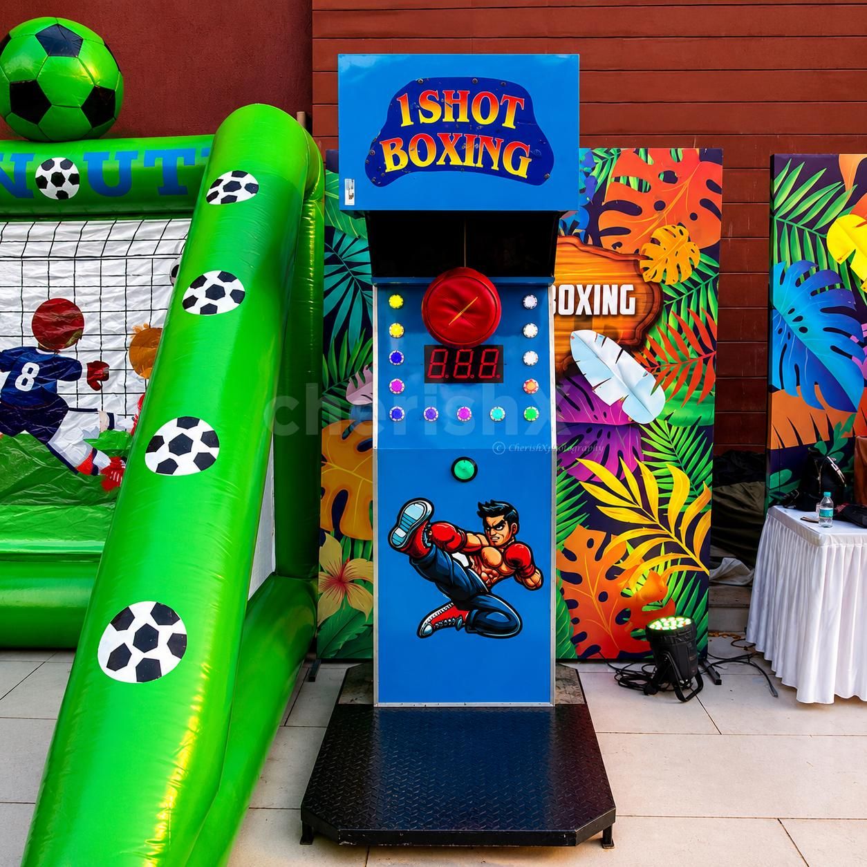 1 Shot Boxing strength game by delivering a powerful punch on the arcade machine at a birthday party or event