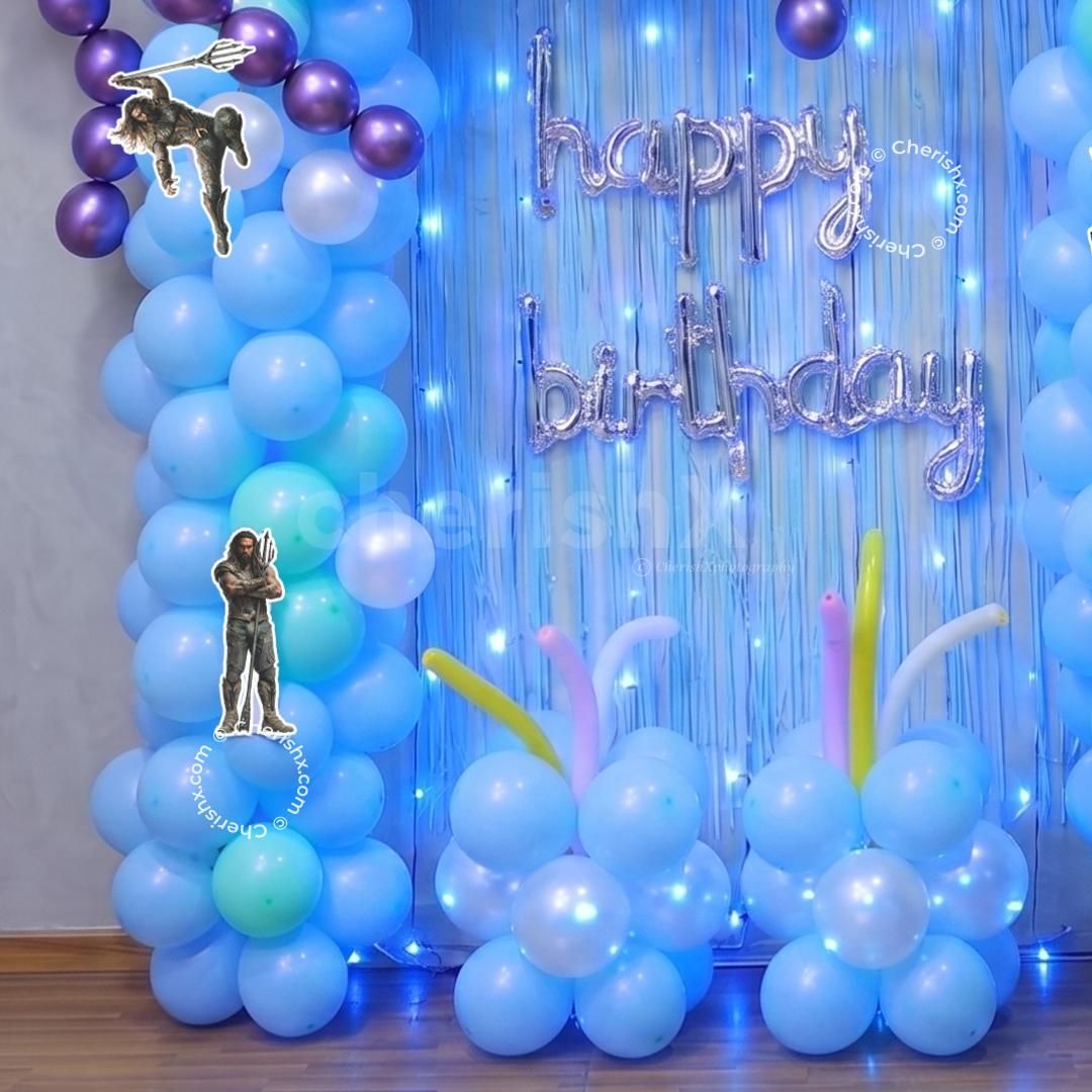 Aquaman Character Standees With Bright And Colourful Floor Balloon Decorations And Decorative Balloon Pillars.