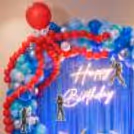 Handmade Octopus Balloon Design Above Decorative Ring With Colourful Balloon Details.