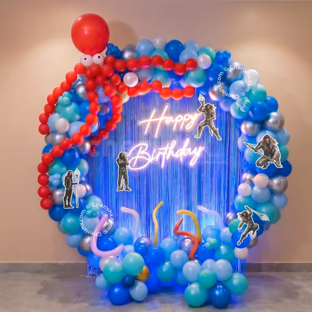 Ocean Design Birthday Backdrop With A Big Happy Birthday Sign And A Red Balloon Octopus.