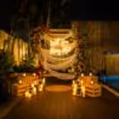 Luxury "Will You Marry Me" poolside proposal setup at Grand Mercure with floral décor, candlelit ambience, and an unforgettable romantic atmosphere.