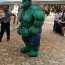 Side view of the giant green superhero figure with its superpowers and big size.