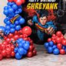 Full ring decor, personalised flex, colourful balloon lay-up, cutouts and floor balloon styling.