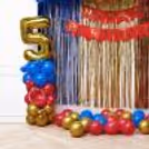 Happy Birthday bunting, superhero decorations, shimmer foil curtain backdrop for a birthday party