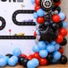 Add An Adventurous Vibe To The Celebration With A Huge Racing Car-Themed Birthday Decor.