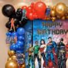 Hero Cutouts In The Birthday Decor Backdrop Spark Action-Packed Photo Moments, Inciting Kids.