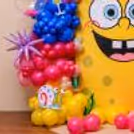 Multi-Coloured, Textured, And Sized Balloon Arch Creates The Perfect Vibrant Underwater Effect