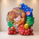 Tropical flex ring backdrop with colourful balloon arch and character artwork for Moana.