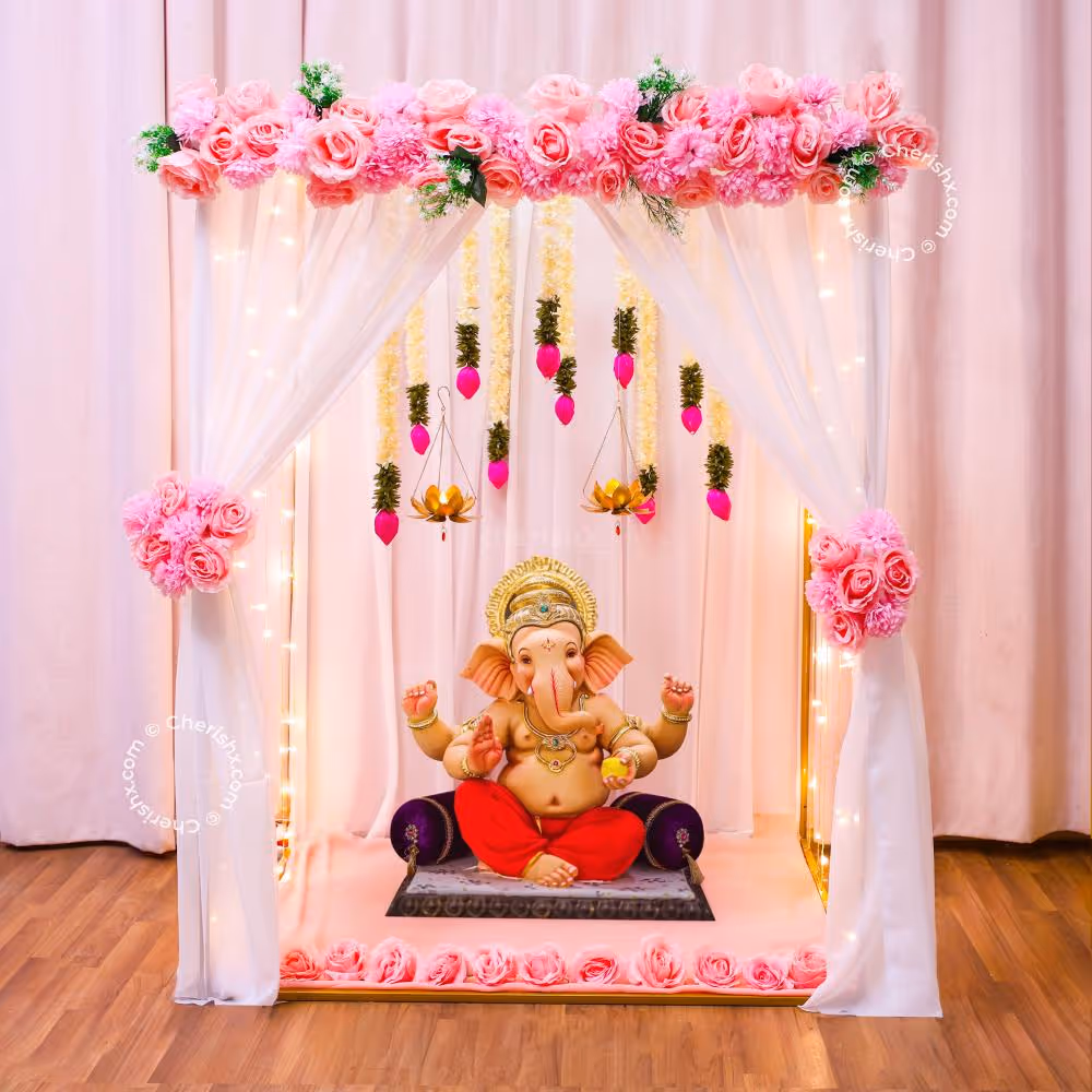 Elegant Pink & White Floral Ganpati Setup