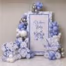 Welcome Baby soft floral blue backdrop with lovely bow and decorative elements.