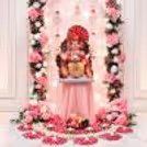 Close-up of a colourful floral arch with hanging rings, pearls and soft fairy lights.