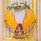 Yellow garlands hung on the side of the celebration area.