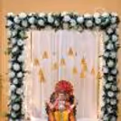 Premium White Ganpati Decor with Golden Bells
